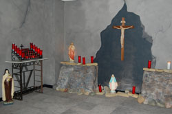 “The Crypt” was decorated to resemble an ancient, secret place of prayer.