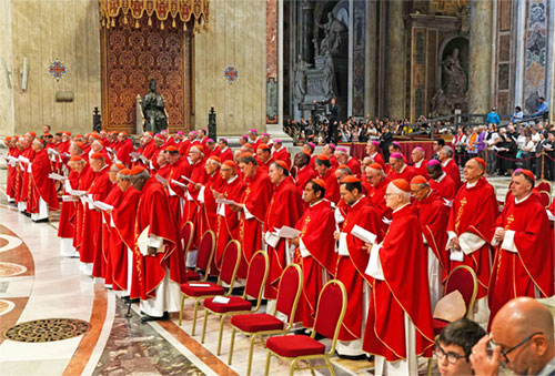 Cardinals concelebrate Mass with Cardinal Víctor Manuel Fernández, former prefect of the Dicastery for the Doctrine of the Faith, on the sixth day of the "novendiali," nine days of mourning for Pope Francis, at the Altar of the Confession in St. Peter's Basilica at the Vatican May 1, 2025. (CNS photo/Lola Gomez)