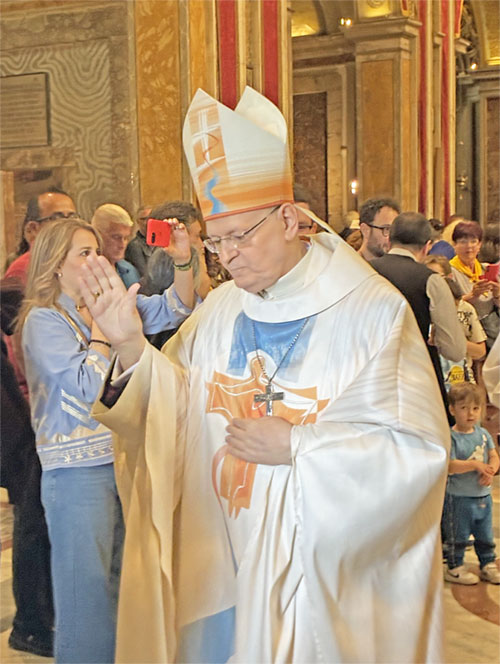 Hungarian Cardinal Péter Erdö, 72, archbishop of Esztergom-Budapest, blesses the faithful as he processes out of Mass at his church of Santa Maria Nuova, also known as the Basilica of Santa Francesca Romana, in the Roman Forum May 4, 2025. (OSV News photo/Michael R. Heinlein)