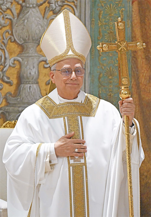 Cardinal Robert Francis Prevost, who has chosen the papal name Leo XIV, appears on the central balcony of St. Peter's Basilica at the Vatican May 8, 2025, following his election during the conclave. He is the first American pope in history. (OSV News photo/Remo Casilli, Reuters)
