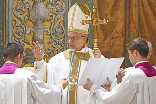 Pope Leo XIV offers a blessing during his first Mass as pope with the cardinals who elected him in the Sistine Chapel at the Vatican May 9, 2025. (CNS photo/Vatican Media)