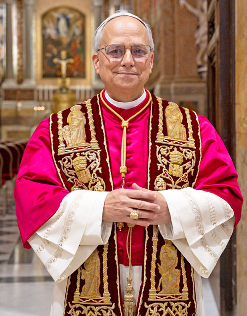 Pope Leo XIV, the former Cardinal Robert F. Prevost, poses for a portrait in the Pauline Chapel of the Apostolic Palace at the Vatican May 8, 2025, soon after his election in the Sistine Chapel. (CNS photo/Vatican Media)