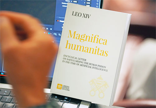 A copy of Pope Leo XIV&rsquo;s first encyclical, &ldquo;Magnifica Humanitas: On Safeguarding the Human Person in the Time of Artificial Intelligence,&rdquo; is seen during a presentation on the document at the Vatican May 25, 2026. (CNS photo/Lola Gomez)