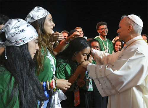 Pope Leo XIV greets young people after presiding over a prayer vigil with hundreds of thousands of young people in Rome's Tor Vergata neighborhood Aug. 2, 2025. Pope Leo will digitally address and dialogue on Nov. 21 with attendees at the 2025 National Catholic Youth Conference in Indianapolis, which is expected to draw about 15,000 young people ages 14-18. (CNS photo/Vatican Media)