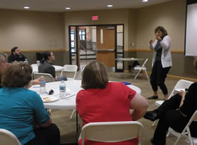 individuals practicing American Sign Language in Mass readings